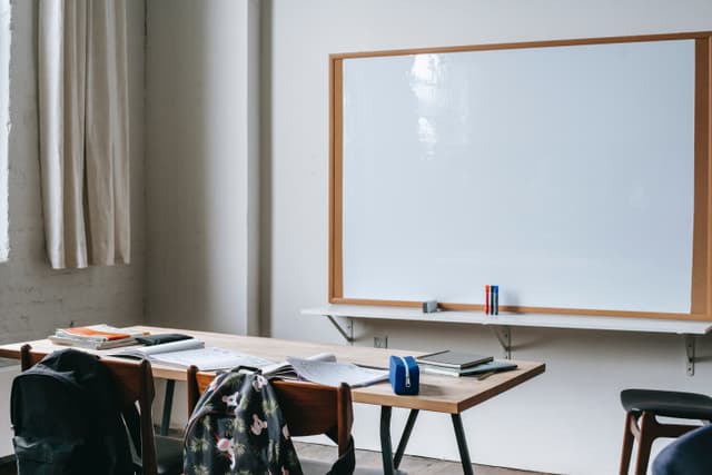 A unicorn in a classroom with students